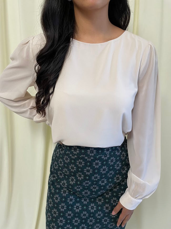 Long Sleeve Chiffon Blouse with Crew Neckline and Pearl Cuffs in Sand Beige