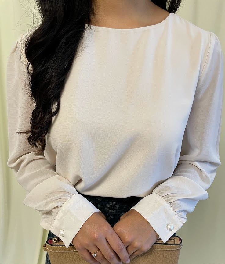 Long Sleeve Chiffon Blouse with Crew Neckline and Pearl Cuffs in Sand Beige