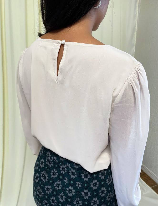 Long Sleeve Chiffon Blouse with Crew Neckline and Pearl Cuffs in Sand Beige